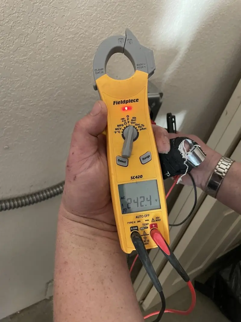 Voltage testing with clamp meter during Circuit Breaker Repair in Farmington